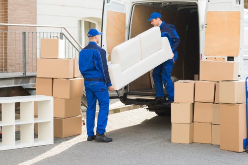 Removal team planning a move in Hollandpark street