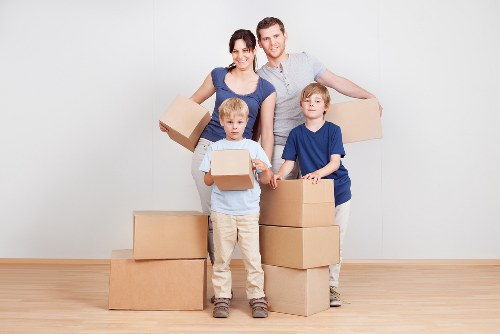 Packed boxes and furniture for a small removals service in Hollandpark